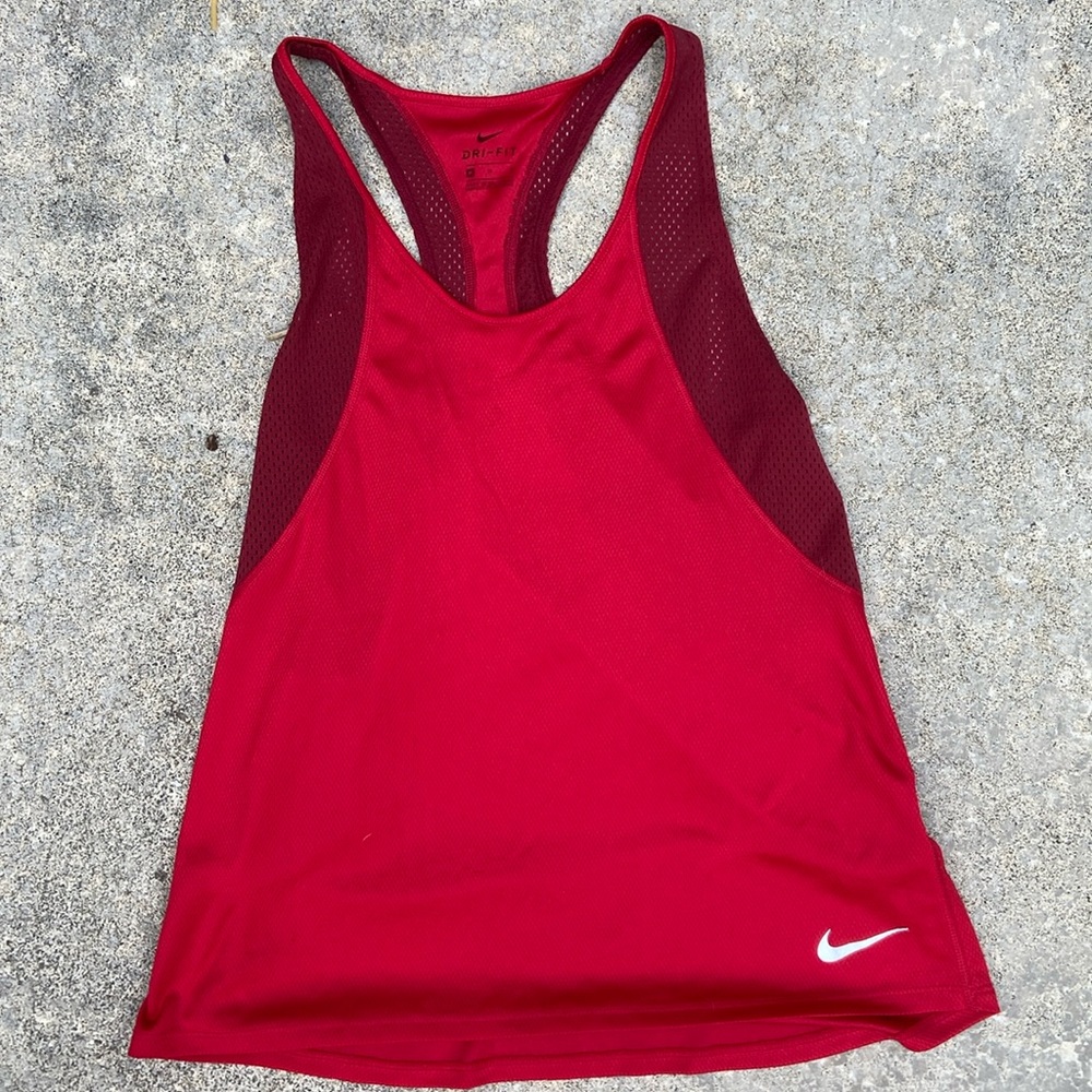 Nike Dri Fit Size M running shirt
Light weight 
Great for gym or running